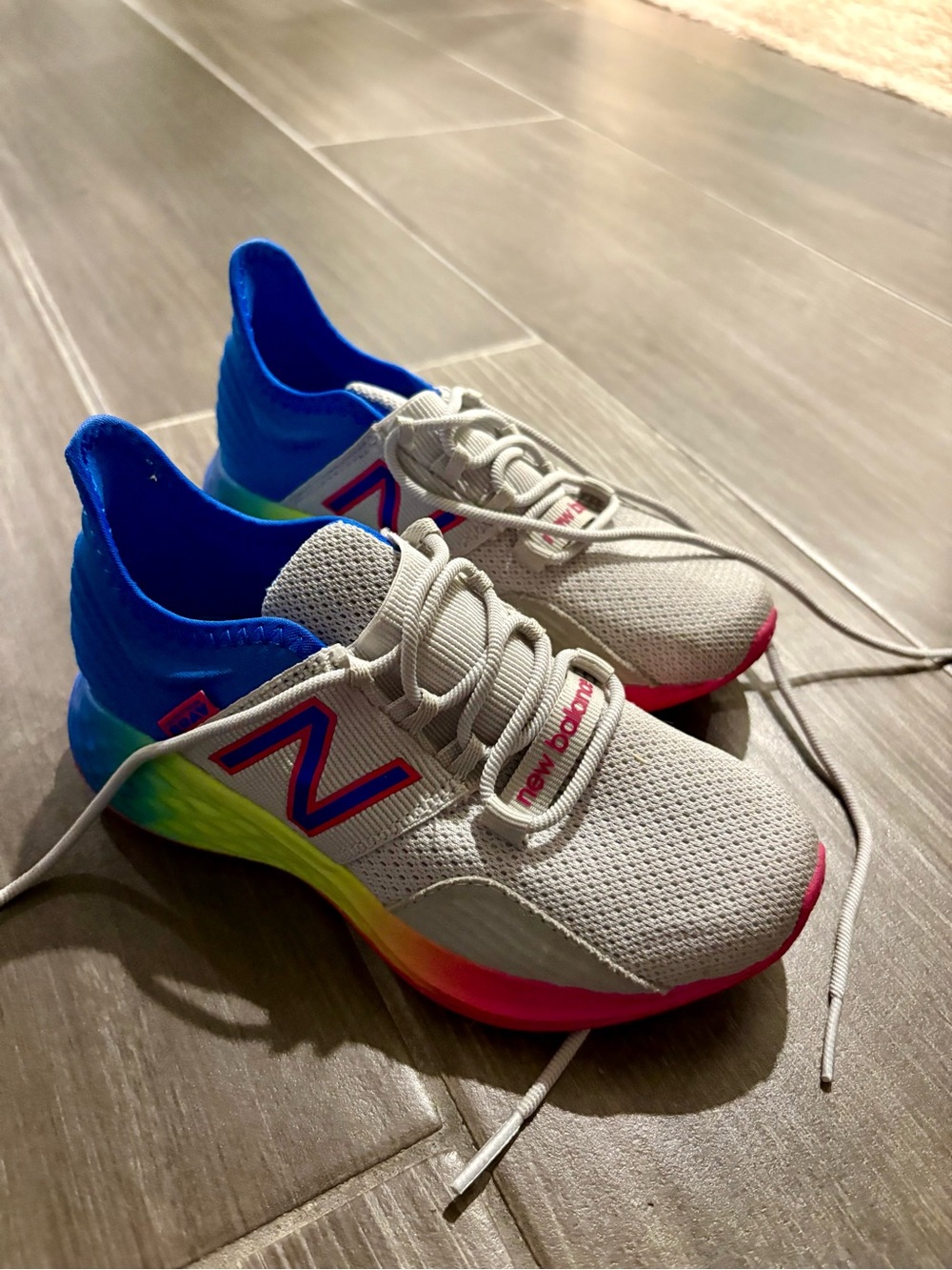 New Balance Kids Gray Sneakers with Rainbow Gradient Sole and Blue Heel